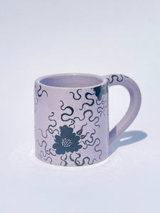 ** NEW ** Lavender Cheeky Blue Figure Mug with Black Flowers